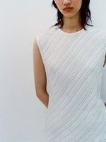 Cropped image of model wearing the Kaia Skirt in Woven Stripe Flou in Chalk/Black