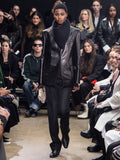 Image of model walking in Proenza Schouler Fall Winter 2024 Runway Show wearing Hayes Jacket in Leather in black