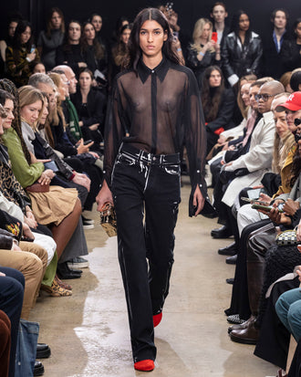 Image of model walking Proenza Schouler Fall Winter 2024 Runway wearing Ryman Jean in black multi