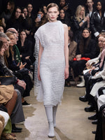 Image of model walking Proenza Schouler Fall Winter 2024 Runway wearing Maude Dress in Geo Lace in cloud