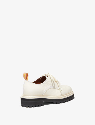 Proenza Schouler Back 3/4 image of lace up loafer in white