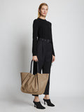 Image of model carrying XL Ruched Tote in LIGHT TAUPE