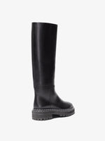 Back 3/4 image of Lug Sole Tall Boots in Black