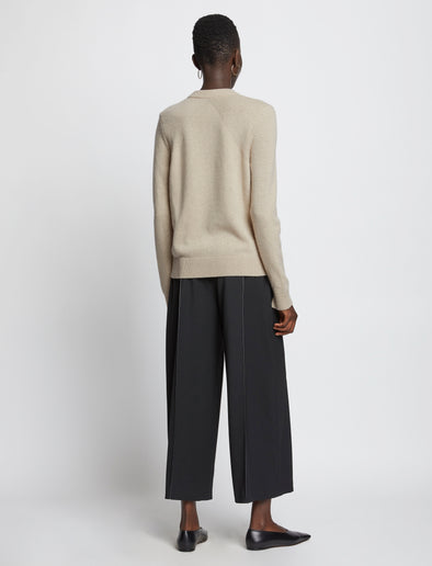 Back full length image of model wearing Eco Cashmere Sweater in OATMEAL
