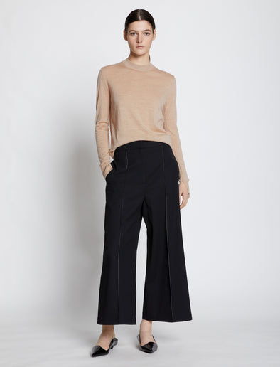 Front full length image of model wearing Eco Superfine Merino Sweater in BEIGE