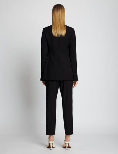 Back full length image of model wearing Upcycled Wool Blazer in BLACK