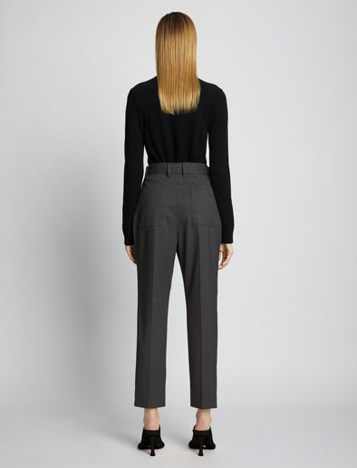Back full length image of model wearing Upcycled Wool Carrot Pants in CHARCOAL