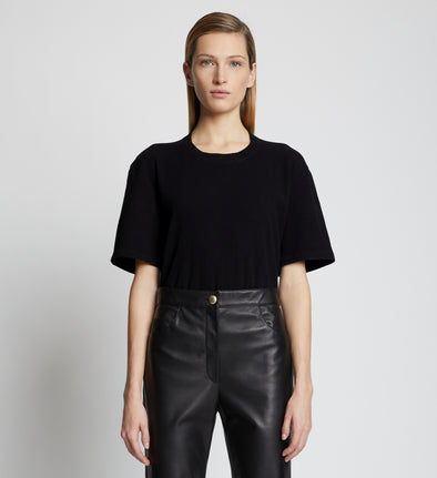 Front cropped image of model wearing Eco Cotton T-Shirt in BLACK