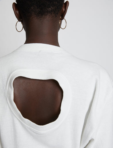Detail image of model wearing Eco Cotton T-Shirt in WHITE
