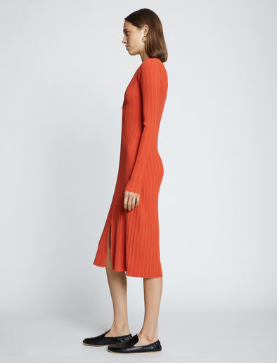 Side full length image of model wearing Rib Knit Zip Cardigan Dress in BRIGHT ORANGE
