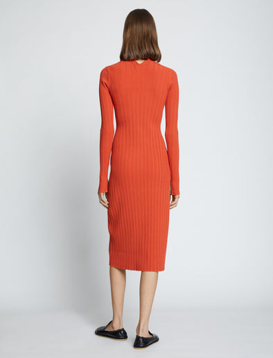 Back full length image of model wearing Rib Knit Zip Cardigan Dress in BRIGHT ORANGE