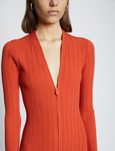 Detail image of model wearing Rib Knit Zip Cardigan Dress in BRIGHT ORANGE