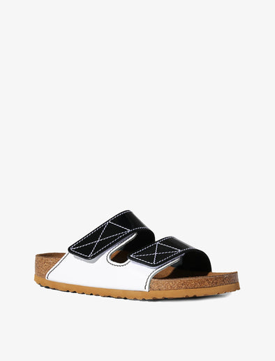 Proenza Schouler front 3/4 image of Arizona PS EXQ Berlin Birkenstock collaboration in White/Black