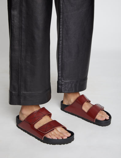 Image of model wearing Birkenstock X Proenza Schouler Arizona Slides in Luggage