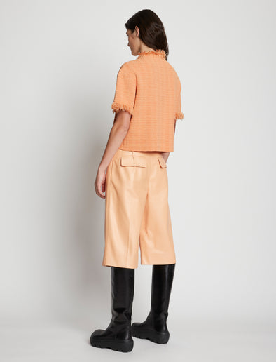 Back full length image of model wearing Viscose Jacquard Top in CORAL