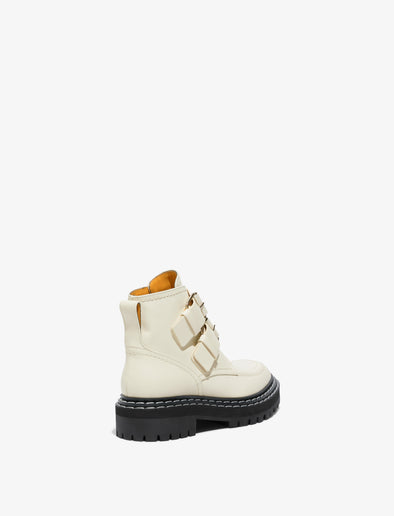 Back 3/4 image of Lug Sole Buckle Boots in Natural