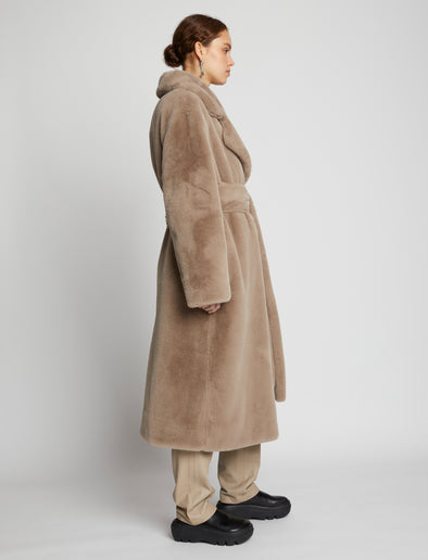 Front full length image of model wearing Faux Fur Belted Coat in TAUPE