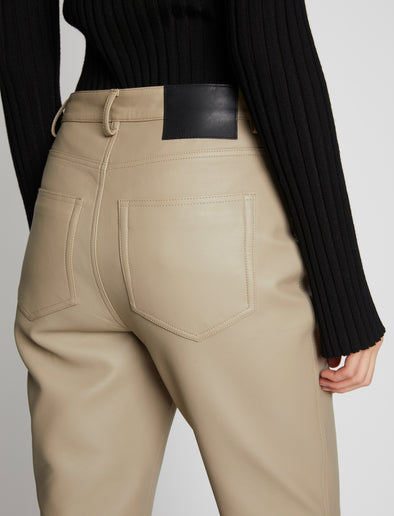Detail image of model wearing Leather Straight Pants in TAUPE