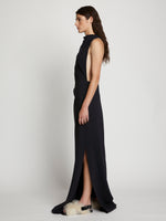 Side image of model in Matte Crepe Backless Dress in black