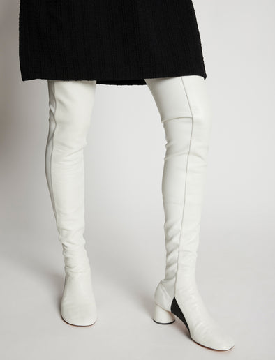Image of model wearing Glove Over the Knee Boots in WHITE