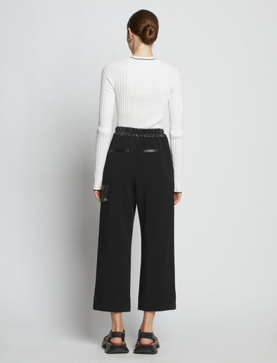 Back full length image of model wearing Crepe Wide Leg Pants in BLACK