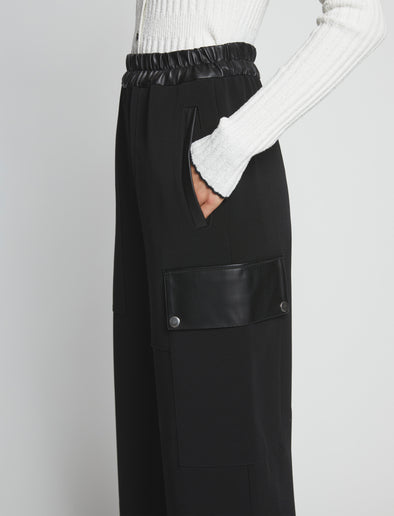 Detail image of model wearing Crepe Wide Leg Pants in BLACK