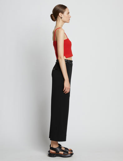 Side full length image of model wearing Cotton Cashmere Tank Top in POPPY