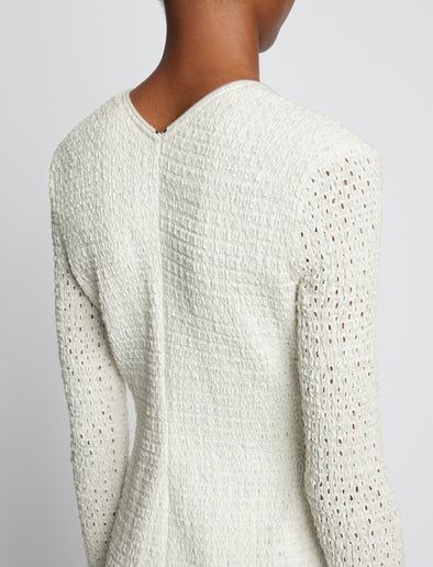 Detail image of model wearing Broderie Anglaise Dress in OFF WHITE