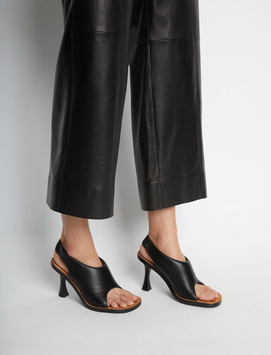 Image of model wearing Leather Ledge Sandals in BLACK
