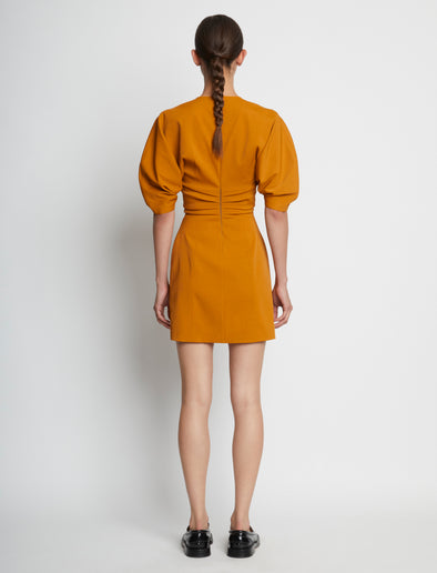 Back full length image of model wearing Technical Stretch Linen Dress in CARAMEL