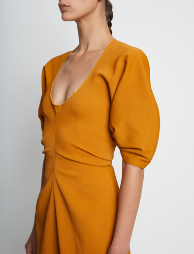 Detail image of model wearing Technical Stretch Linen Dress in CARAMEL