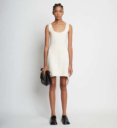 Front full length image of model wearing Compact Viscose Knit Sculpted Dress in ECRU