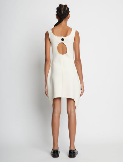 Back full length image of model wearing Compact Viscose Knit Sculpted Dress in ECRU