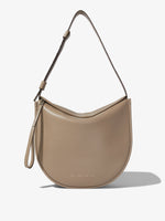 Front image of Baxter Leather Bag in CLAY with strap extended