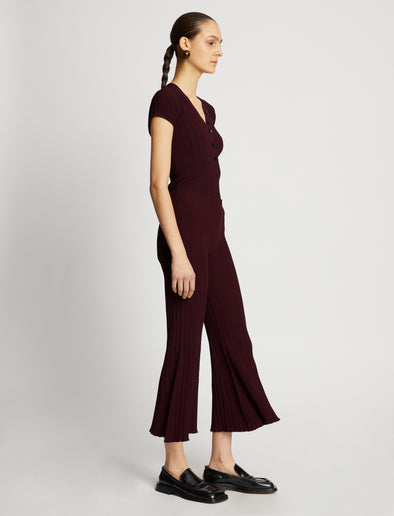 Side full length image of model wearing Rib Knit Pants in PLUM