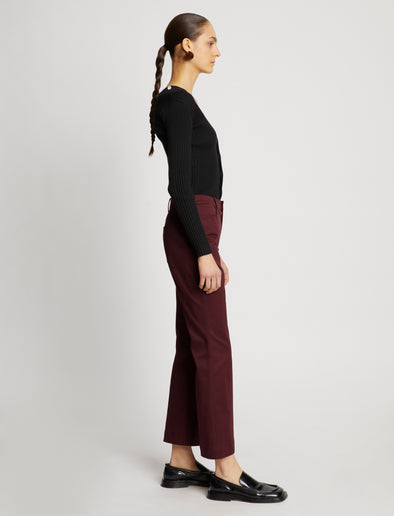 Side full length image of model wearing Cotton Twill Cropped Pants in PLUM