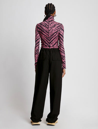 Back full length image of model wearing Drapey Suiting Drawstring Pants in BLACK