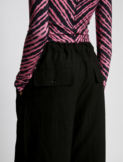 Detail image of model wearing Drapey Suiting Drawstring Pants in BLACK