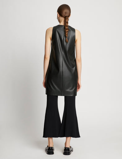 Back full length image of model wearing Faux Leather Sleeveless Dress in BLACK
