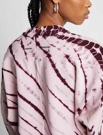 Detail image of model wearing Tie Dye Sweatshirt in LIGHT PINK/PLUM