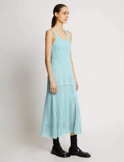 Side full length image of model wearing Open Knit Dress in PALE BLUE