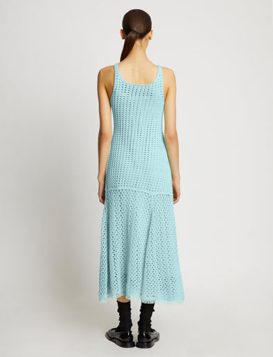 Back full length image of model wearing Open Knit Dress in PALE BLUE