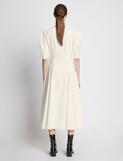 Back full length image of model wearing Cotton Viscose Zip Front Dress in ECRU
