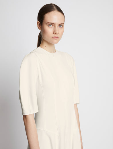 Detail image of model wearing Cotton Viscose Zip Front Dress in ECRU