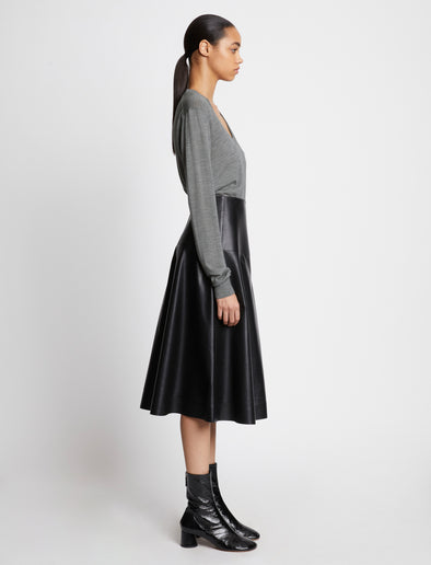 Side full length image of model wearing Eco Superfine Merino Scoop Neck Sweater
in GREY MELANGE