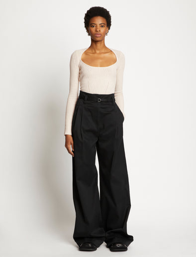 Front full length image of model wearing Plaited Rib Scoop Neck Sweater in BONE/PALE CASHEW