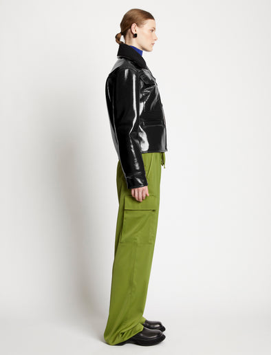 Proenza Schouler Side full length image of model wearing Lacquared Fleece Collar Jacket in Black