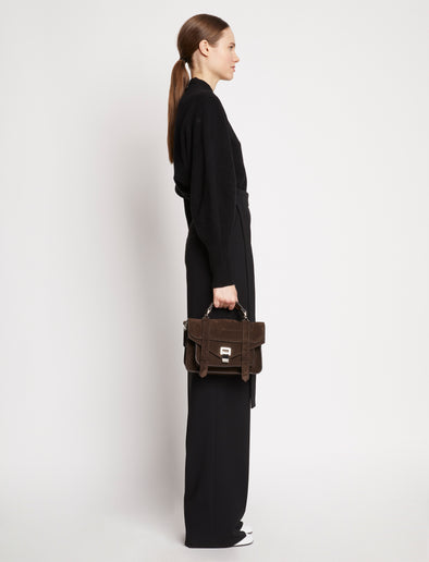 Image of model wearing Suede PS1 Tiny Bag in DARK CHOCOLATE