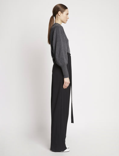 Side full length image of model wearing Eco Cashmere Balloon Sleeve Sweater in GREY MELANGE