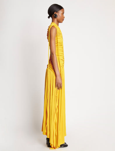 Side full length image of model wearing Viscose Jersey Sleeveless Cinched Dress in YELLOW